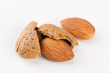 Whole almonds nuts isolated on white background
