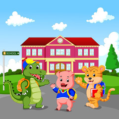 happy animal cartoon standing in front of school building