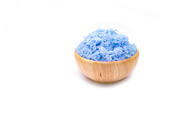 Rice cooked with blue butterfly pea in wooden bowl isolated on white
