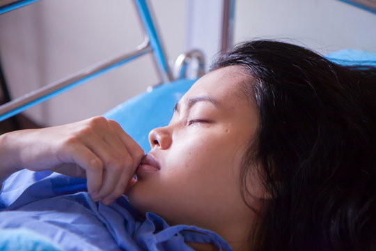 Asian Mother With Newborn Baby In The Hospital