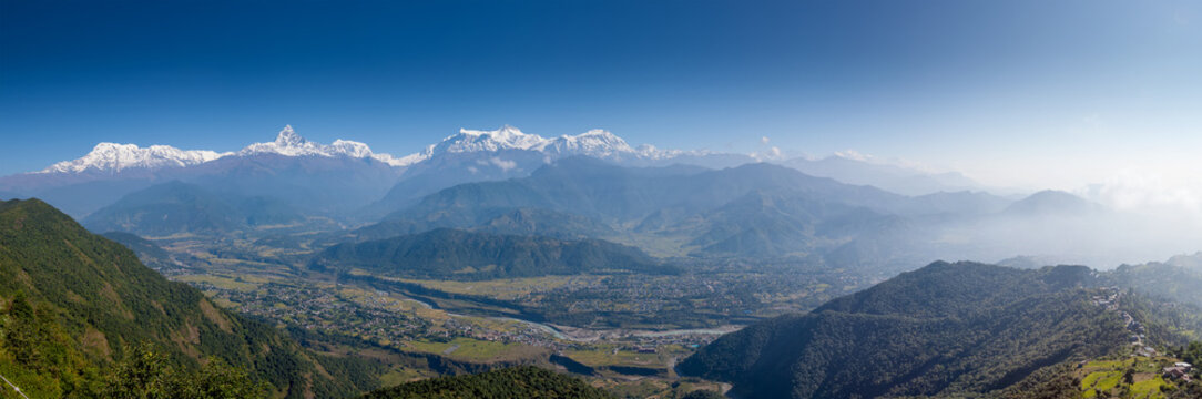 Panoramic view to the Himalayas from Sarangkot hill near Pokhara in Nepal