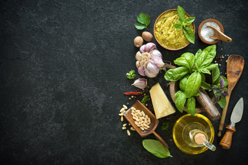 Fototapeta na wymiar Ingredients for homemade green basil pesto