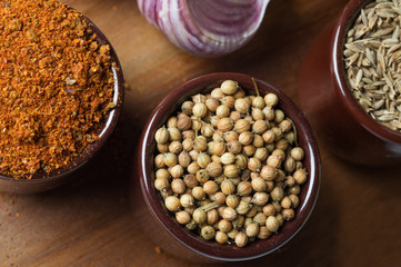 Spices and herbs in ceramic bowls. Food and cuisine ingredients. Colorful natural additives.