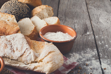Bread background with copy space on rustic wood