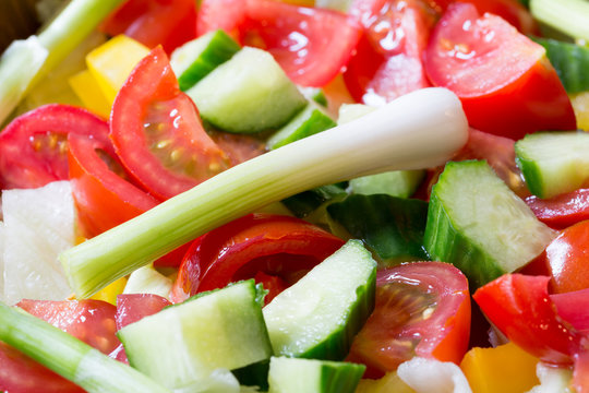 Tomato, cucumber, pepper and spring onion salad