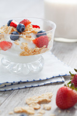 close up view of nice fresh yummy parfait on color back