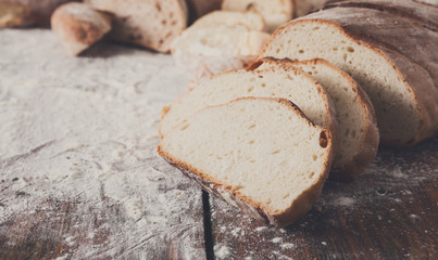 Bread background closeup on wooden table