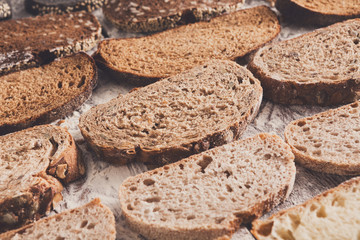 Bakery concept. Plenty of sliced bread background