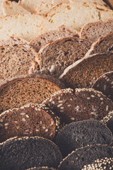 Bakery concept. Plenty of sliced bread background