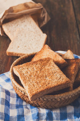 Breakfast background, toasts on checkered napkin closeup