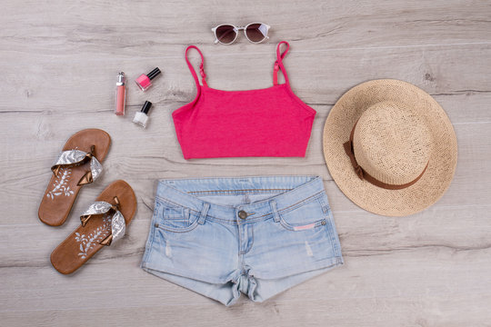 Bright top with denim shorts.