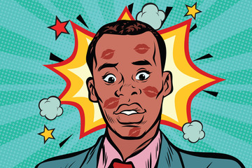 Kissed the embarrassed African man with lipstick on face