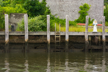 Empty dock along retaining wall in Wareham Harbor