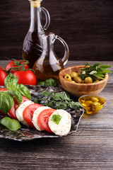 Caprese salad with tomatoes, mozzarella and basil.