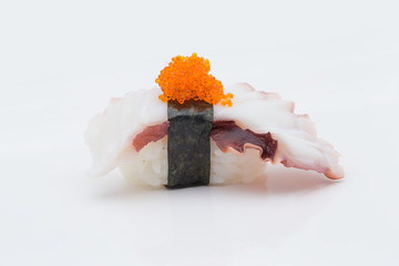 Tako sushi with flying fish eggs on white background