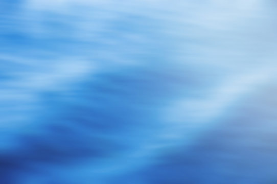 Abstract lighting on water ripple in blurred background concept