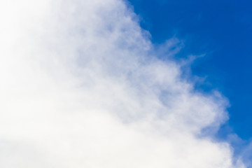 Blue sky with clouds background lines intersect.