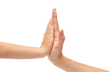 hand of young girl and kids hand gesture, shows high five. Isolated on white background
