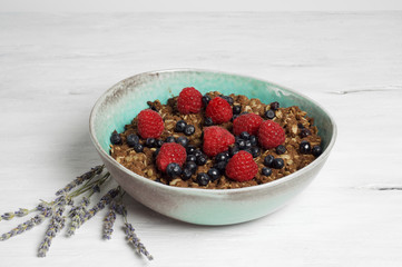 Healthy oat and almond flour berry crumble with soja yogurt