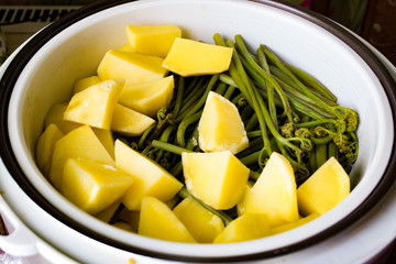 Steamed potatoes and bracken