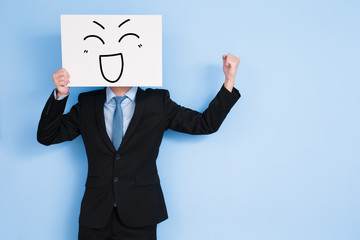 businessman take happy billboard