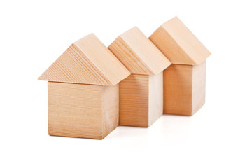 Toy houses made of wooden blocks