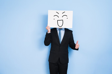 businessman take happy billboard