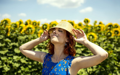 lady enjoy on sun in sunflower field