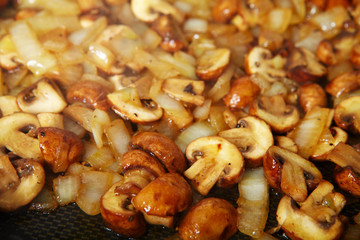 Fried mushrooms in a frying pan