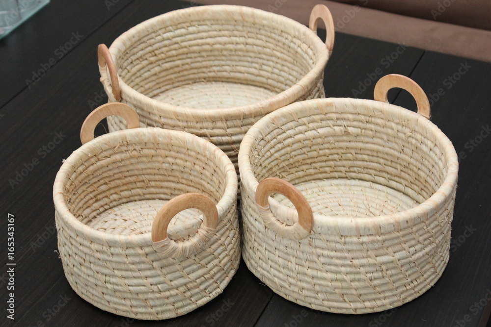 Wall mural three handmade woven baskets