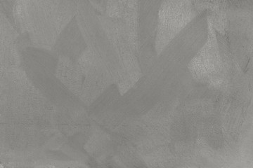 Roughly light gray painted canvas with large sweeping smears, background
