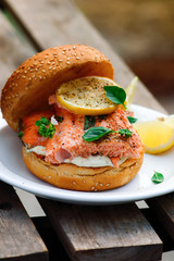 Fish burger with herb and lemon sauce.
