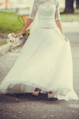 Fototapeta na wymiar Bride in wedding dress