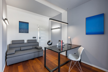 Home office with black table