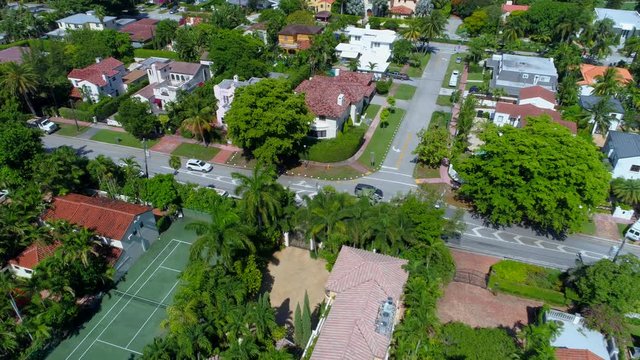 Aerial backfly mansions Miami Beach 4k 24p
