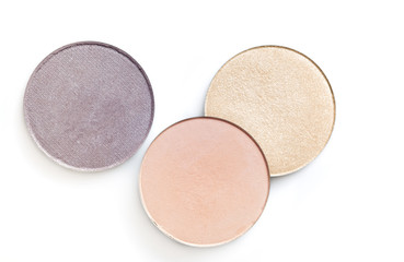 Beige and pink eye shadow or blusher isolated on white background