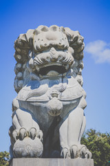 Obraz premium Chinese lion stone statue. Oriental statue