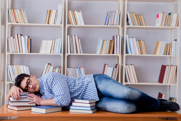 Young student taking break and falling asleep