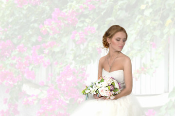 the bride with a bouquet  against the background of flowers