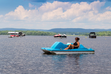 adult woman on a pedal boat alone