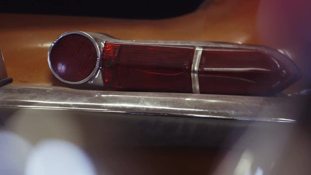 Taillight of the Jaguar E-Type Classic Car. Car Ready to Restore