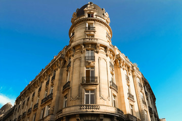 Fototapeta na wymiar The facade of Parisian building, France.