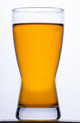 Yellow drink in the glass