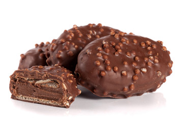 chocolate candy with cream filling isolated on white background