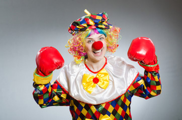 Funny clown in comical concept