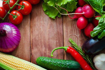 Vegan food and dishes. Pumpkin soup, salad, vegetables, fruits, lentils on rustic black chalk board background. Healthy, clean eating concept. Vegan or gluten free diet. Space for text. Vegan dinner