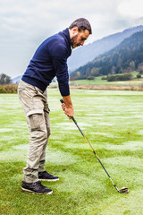 Golf player in the morning