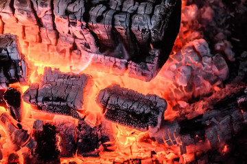 The charcoal red orange color close-up very hot