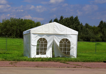 Fototapeta na wymiar White tent at the camp