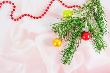 Christmas and New Year decorations. greeting card with christmas balls and  fir tree. Copy space.